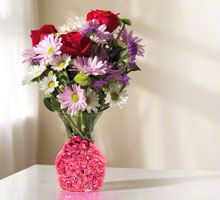 photo of deco beads in a vase with flowers